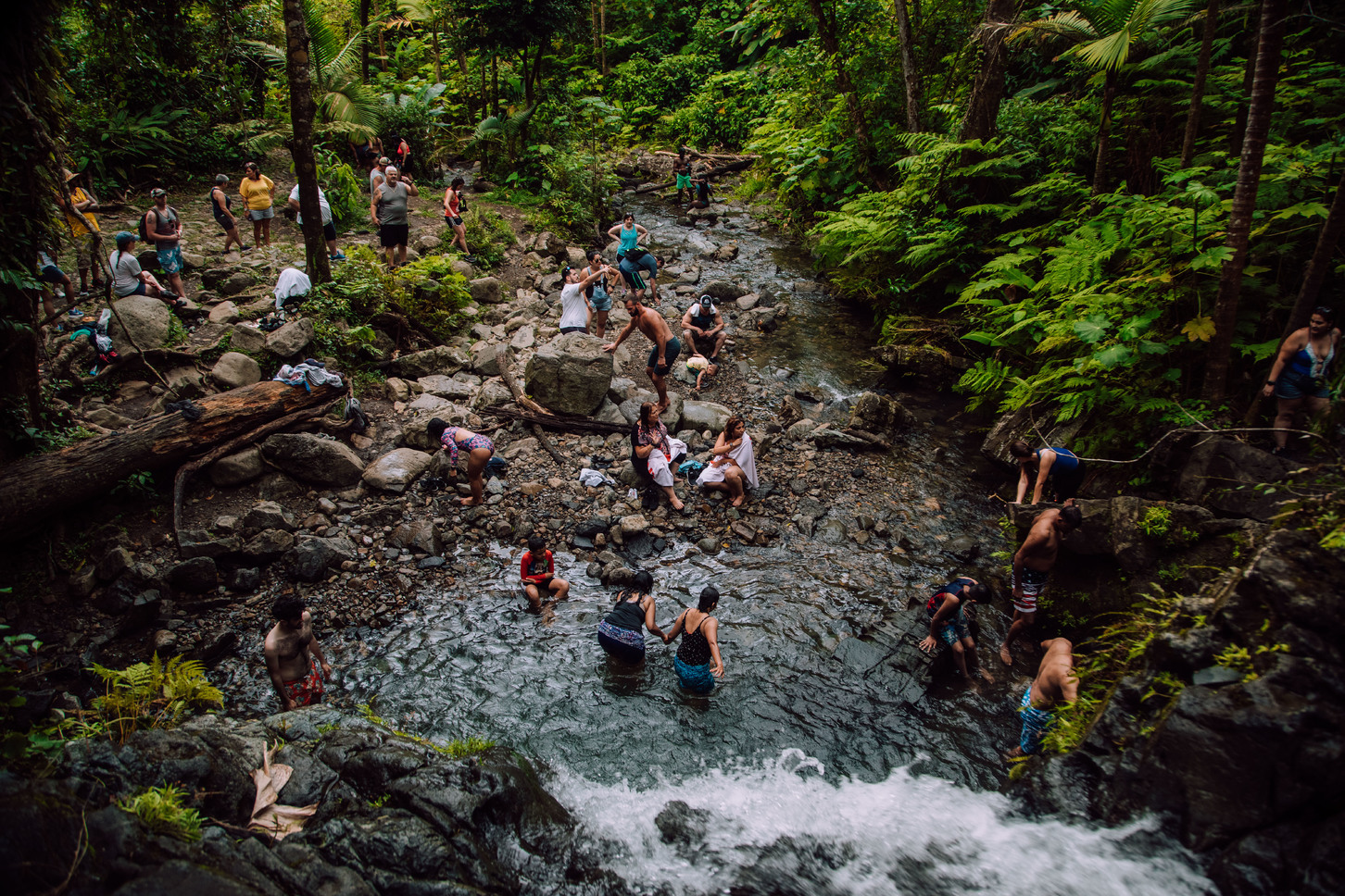 A youth group visits El Yunque and its natural pools.