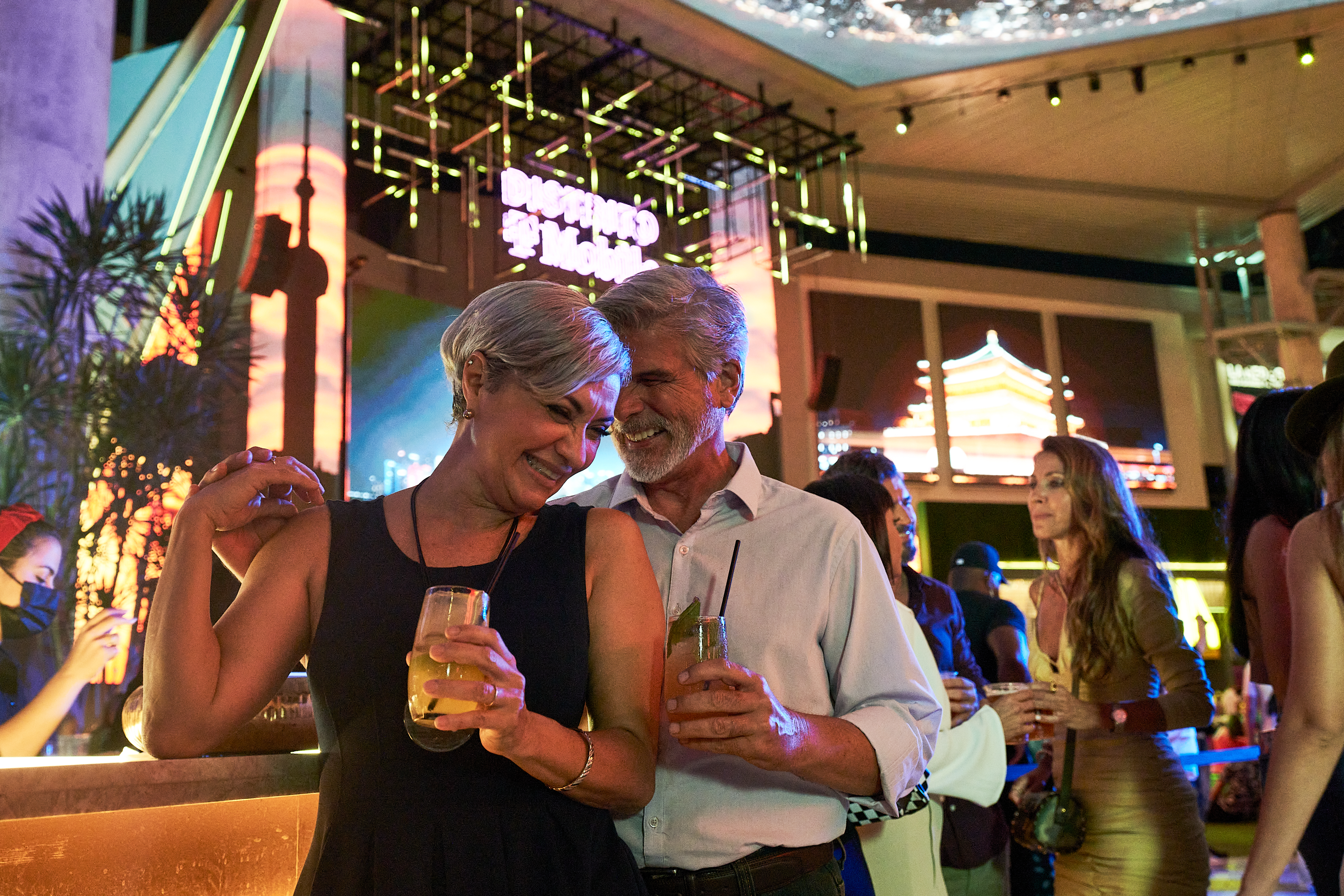 Couple having a drink and enjoying a night out.