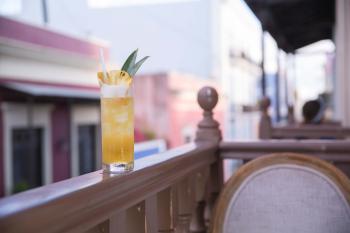 a tropical drink on the terrace of the mezzanine. 