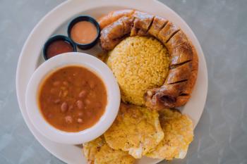 The Puerto Rican longaniza at Restaurante La Sombra is worth the wait!