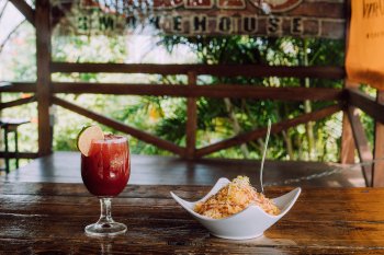 A glass of sangria and creole cuisine at ASAO smokehouse in Ciales