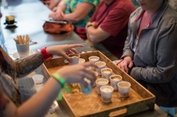 A group samples local coffee in Puerto Rico.