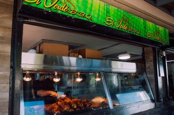 Glass display of El Verde's roasted chiken