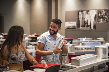 Two people enjoying a rum tasting session in Casa Bacardí.