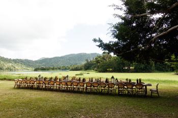 A private lake-side event in Hacienda Palo Alto, Trujillo Alto. Décor by Innovation DMC.