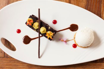A chocolate-based dessert highlights different shapes and textures.