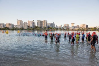 Competitors in the IRONMAN 70.3 Puerto Rico prepare to begin swimming in San Juan, Puerto Rico.