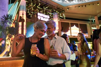 Couple having a drink and enjoying a night out.