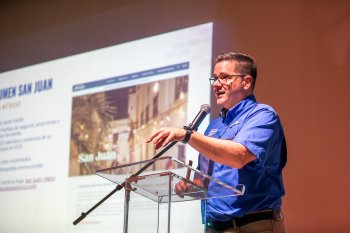 VP of Communications, Ricardo Cortes offers a conference in san Juan