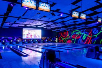 The glow-in-the-dark bowling alley at Predator Gaming Center.