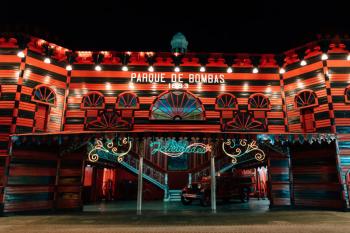 The red-and-black-striped Parque de Bombas, a former fire station in. Ponce, Puerto Rico, is illuminated at night.