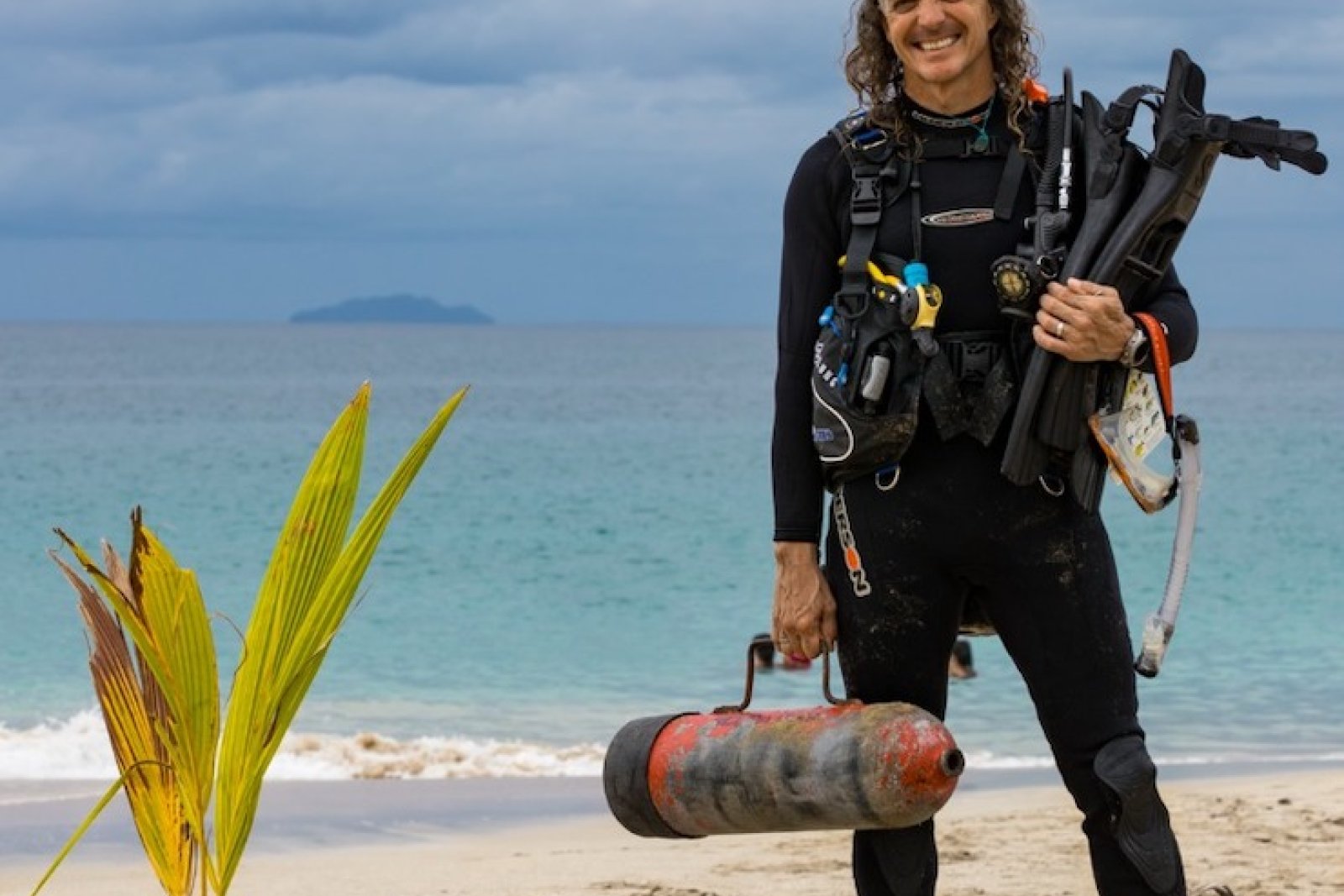 Scuba instructor on the beach at Crash Boat.