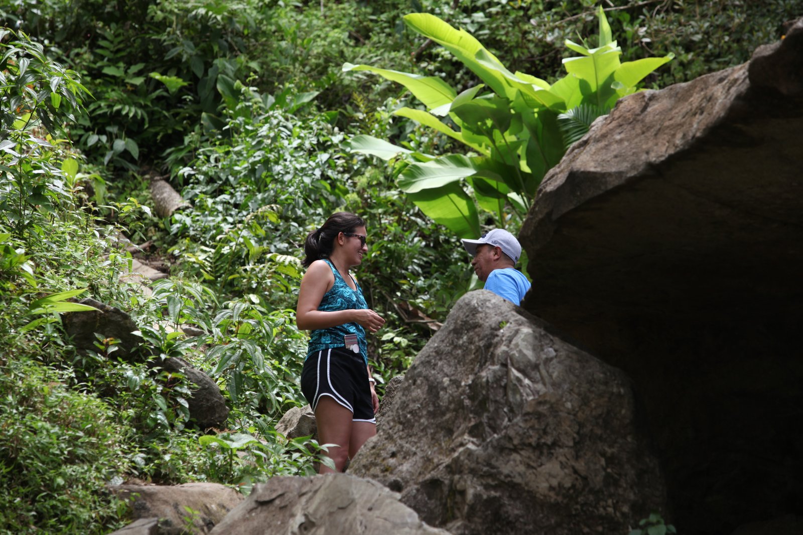 Prople hike upone of the trails of El Yunque 