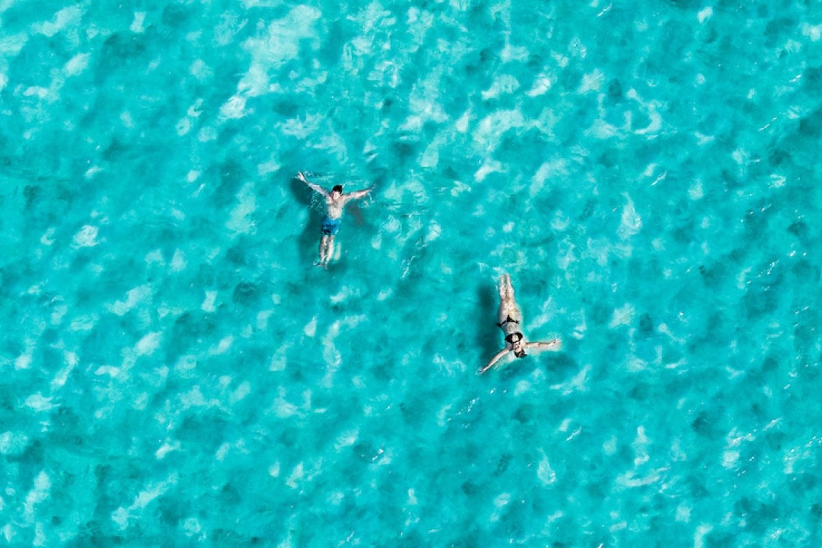 Visitors lay in the clear water in La Parguera