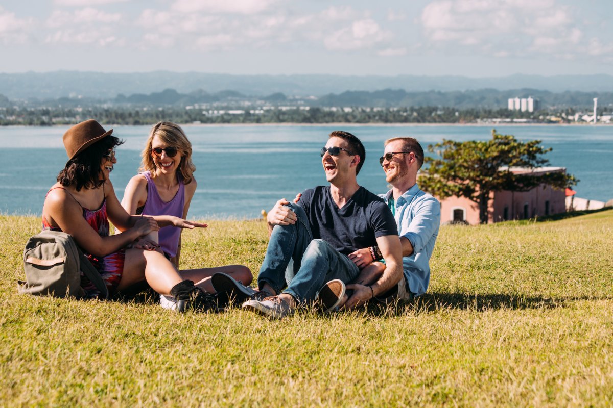 Couples enjoy the warm Puerto Rican day in a park