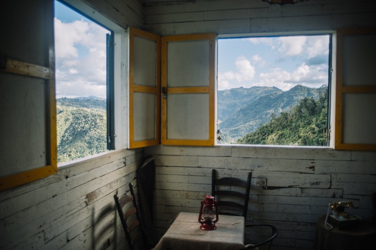 Mountain views outside the windows at Casa Vieja Restaurant in Ciales.