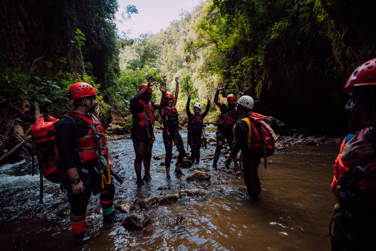 A group visiting the Tanama River