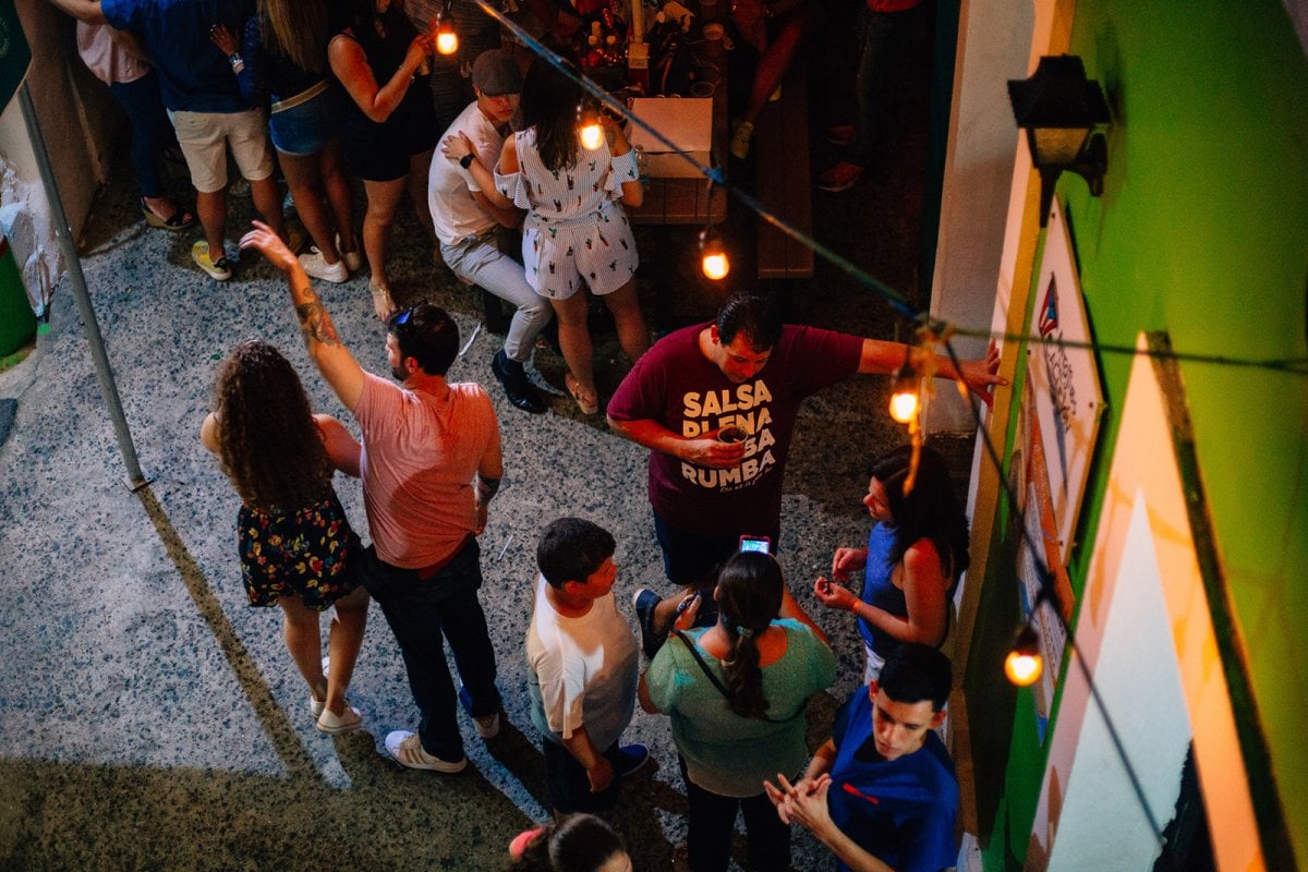 People talking and having a good time in La Placita de Santurce.