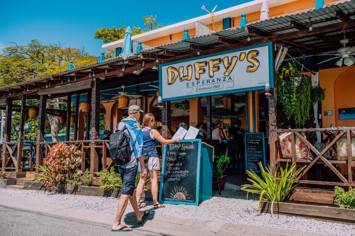 People entering a quaint restaurant in Vieques.