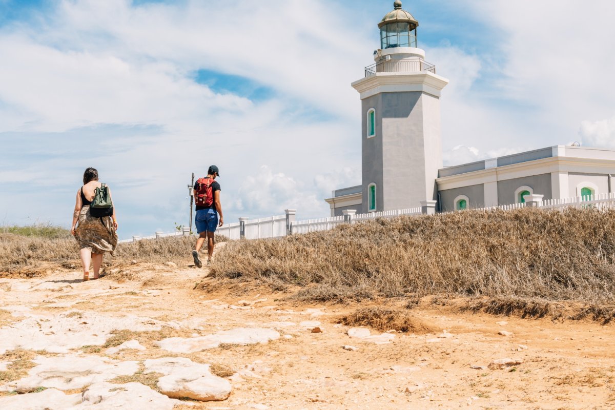 Young people visiting Cabo Rojo's lighthouse.