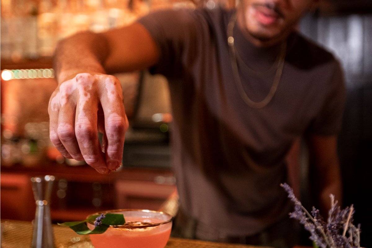 A bartender puts the finishing touches on a cocktail at a bar in Puerto Rico.