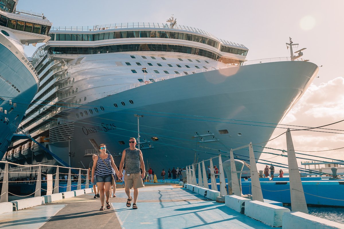 A female and make couple disembarking from their cruise to the port in Old San Juan.