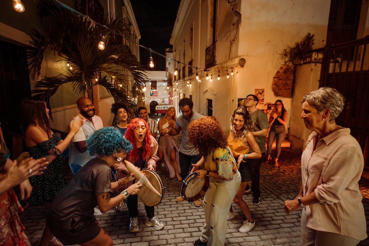 People dance on a street in Old San Juan