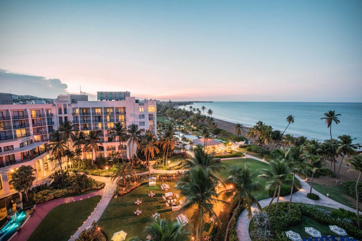 A lighted garden at the Wyndham Grand Rio Mar resort in Rio Grande, Puerto Rico, is pictured at sunset.