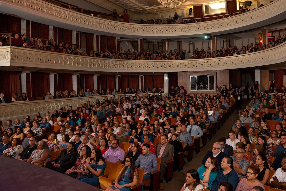 Group of people in the theater.