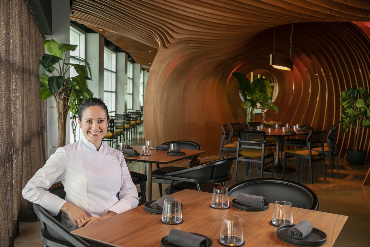 Chef Carol Reyes in Boveda dinning area.