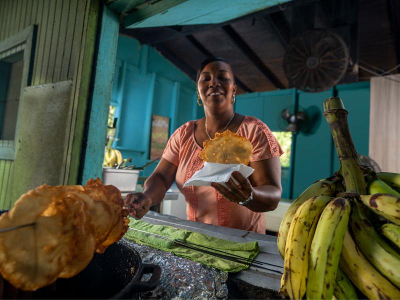 Guide To Traditional Puerto Rican Food 2023   Woman Cooking 