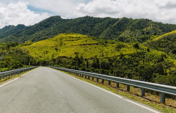 A wide view of a road through Puerto Rico's Mountains. 