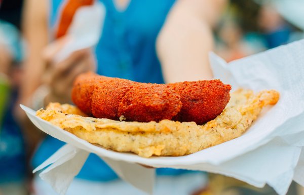 A plate full of Puerto Rican fritters.