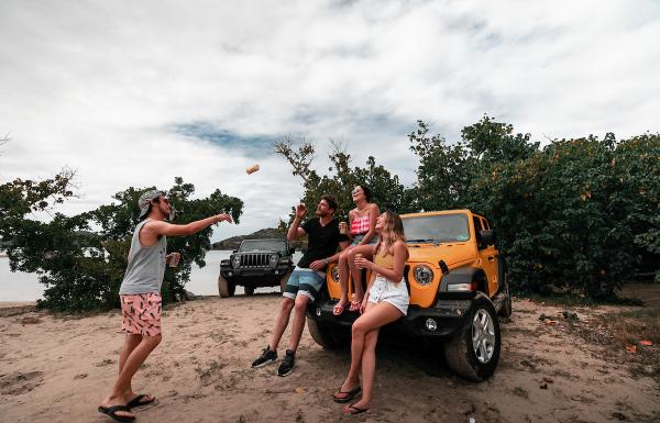 A group of friends talking during their road trip around Culebra. 