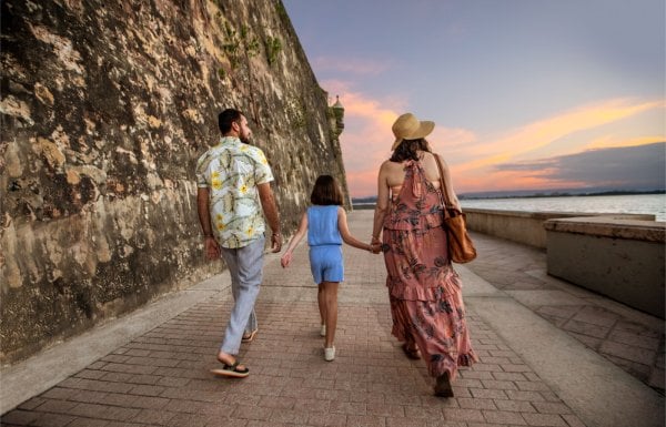 A family explores Paseo de la Princesa in San Juan, Puerto Rico