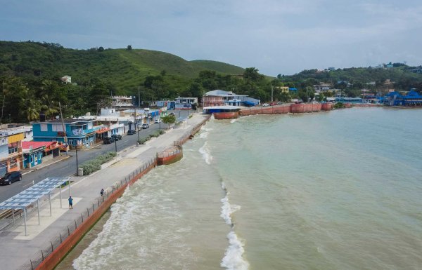 Aerial view of Malecón de La Playa Hucares (el Malecón de Naguabo), an iconic boardwalk lined with restaurants and food kiosks. Naguabo, Puerto Rico.