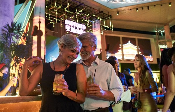 Couple having a drink and enjoying a night out.