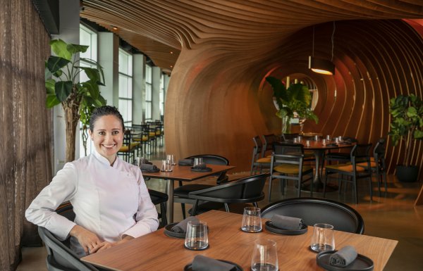 Chef Carol Reyes in Boveda dinning area.