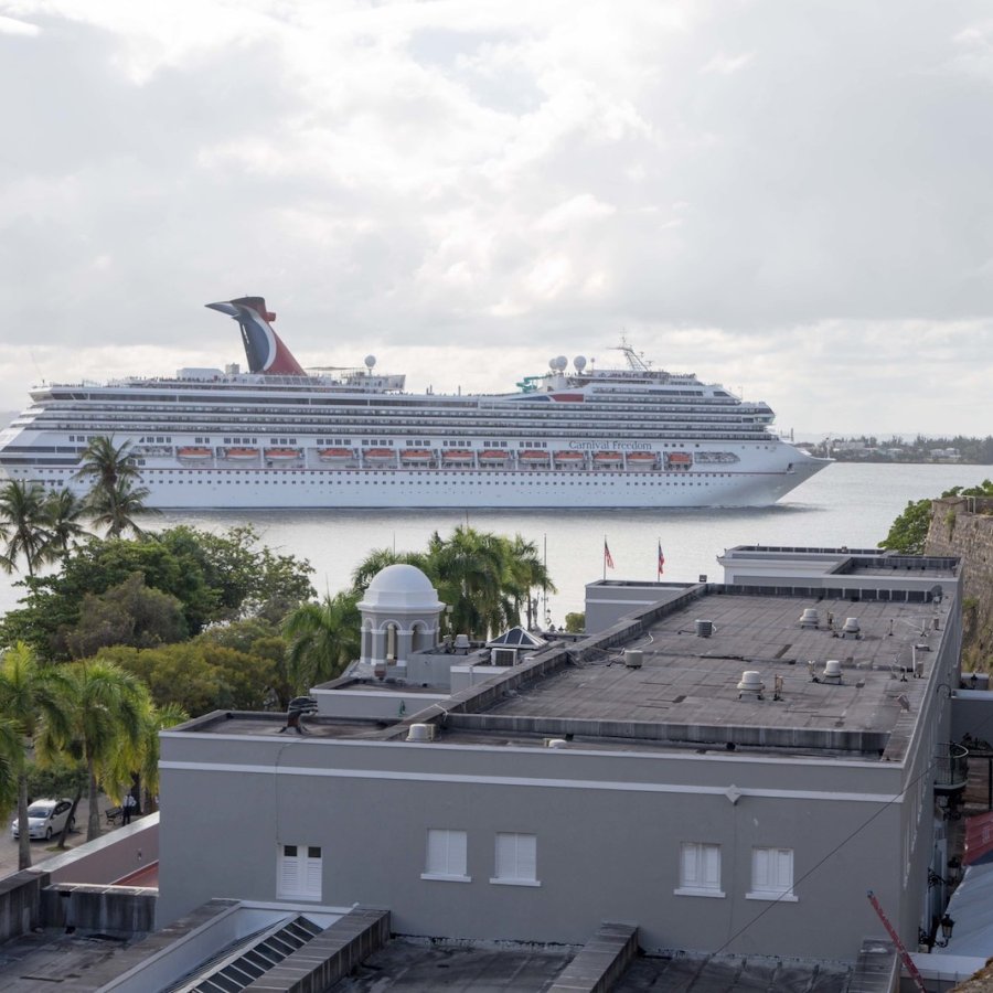 A cruise ship sails by off the coast of San Juan.