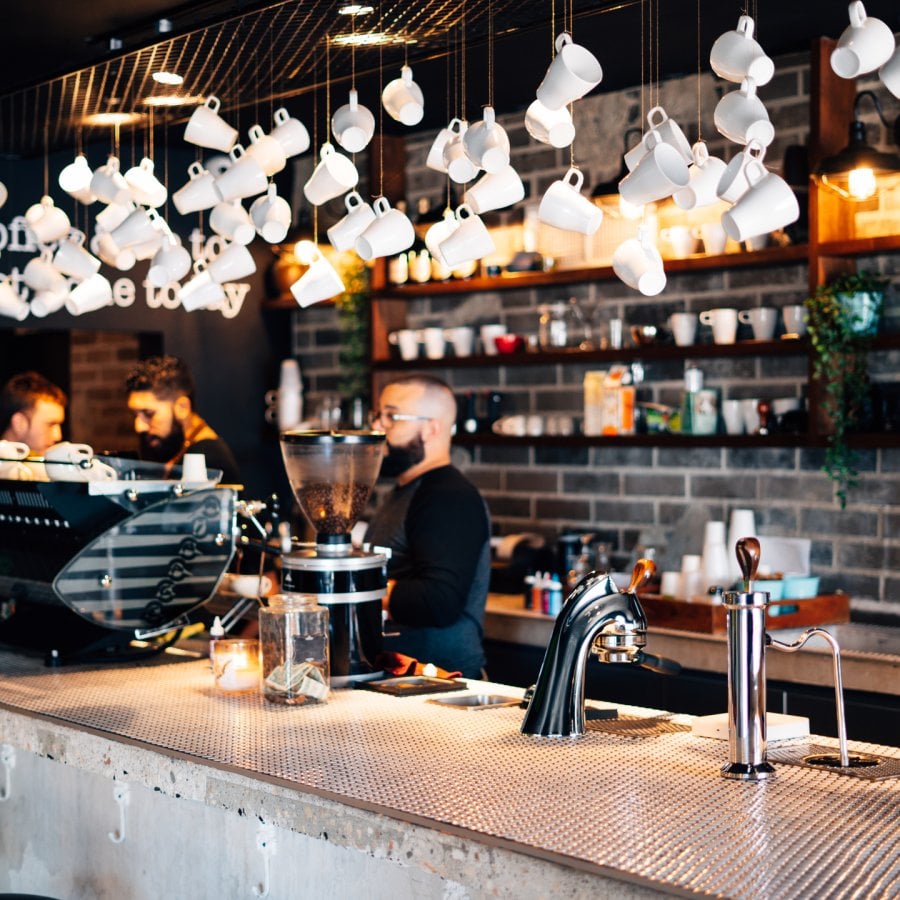 Decorative coffee cups hang from the ceiling at Bistro Cafe in Carolina.