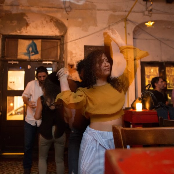 A woman dances at La Factoria in Old San Juan.