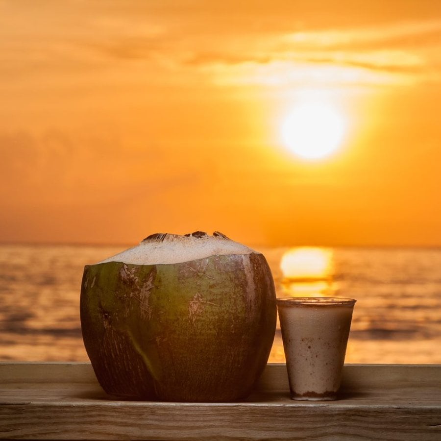 The Coco Pirata cocktail is served inside a coconut