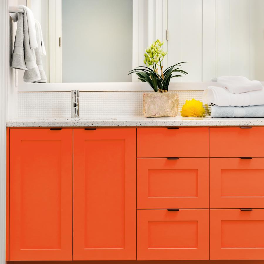 Bathroom vanity cabinets painted using ECOS Puerto Rico Sunshine.