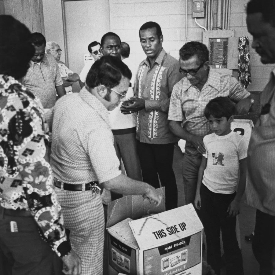 Roberto Clemente doing charity work.