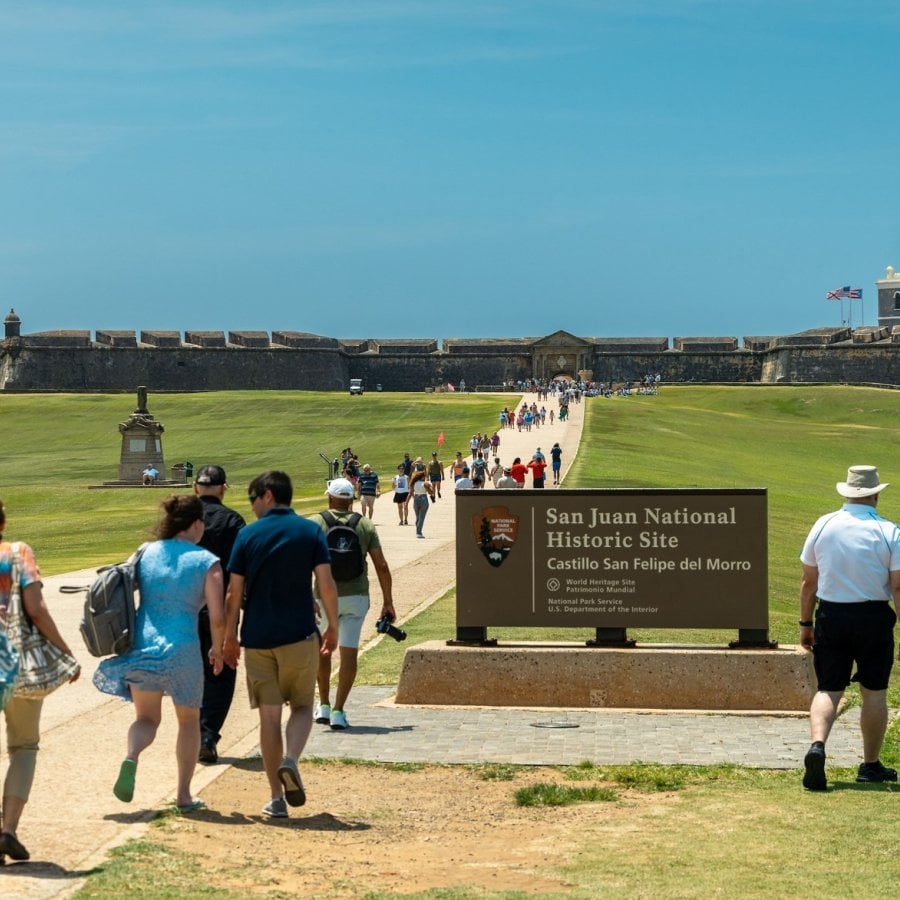 Tourists walk into El Morro, Old San Juan's historic fort. 