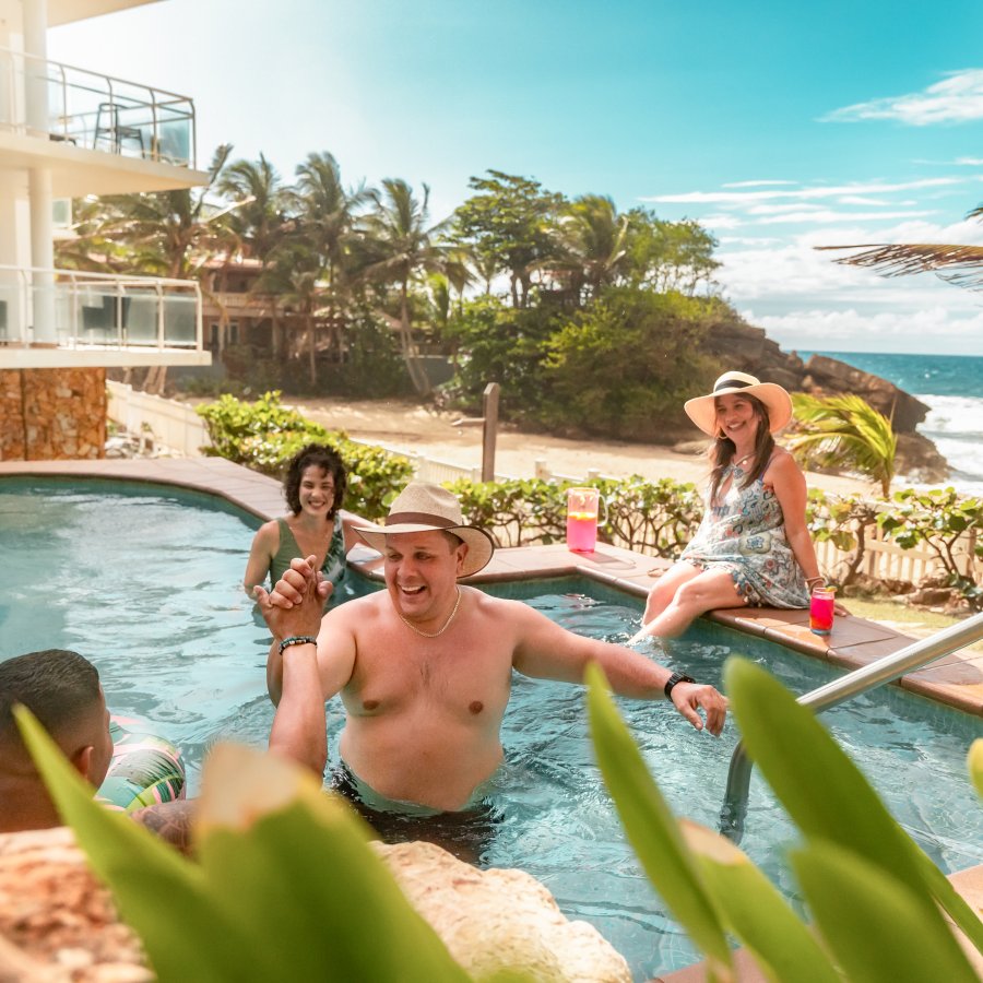 A family enjoys a pool day