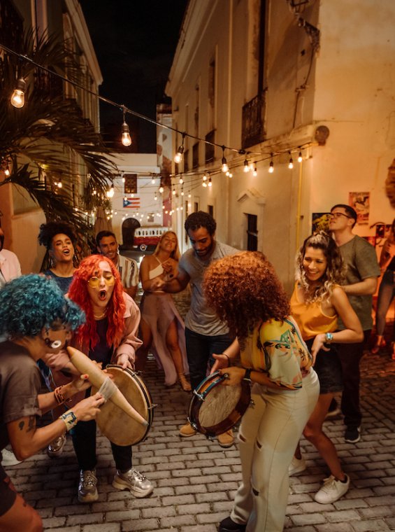 People dance on a street in Old San Juan